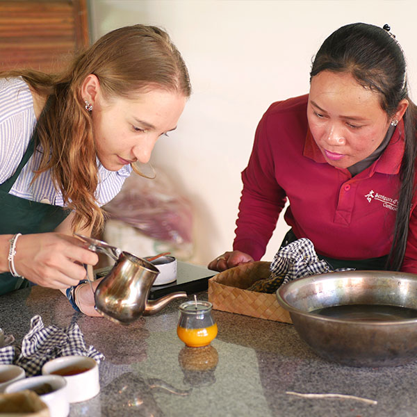 At Senteurs d'Angkor our artisan, teach the steps and guide how to make scented candle.
